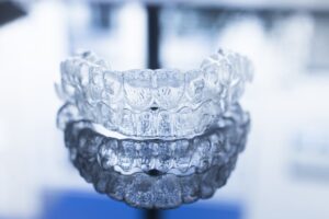 Types Of Orthodontic Treatments: FAQ - clear plastic ortho liners