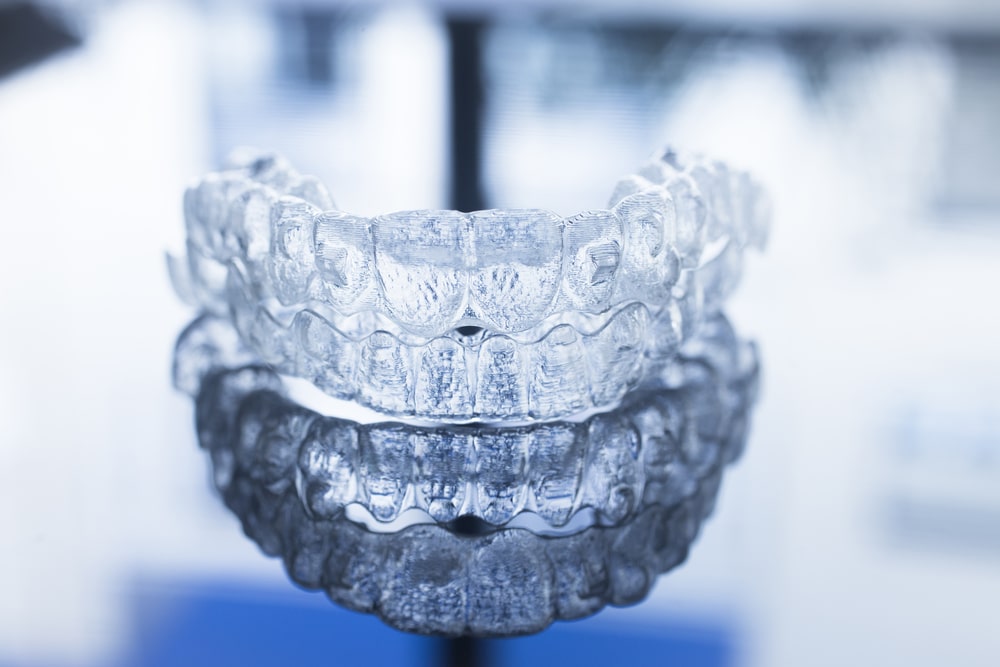 Types Of Orthodontic Treatments: FAQ - clear plastic ortho liners